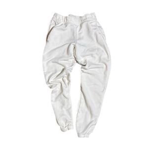 Cream colored The North Face sweatpants (small)